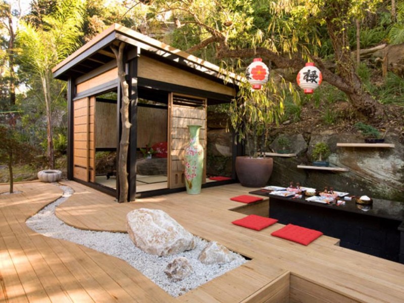 japanese dinine hall outdoor with granite black pond