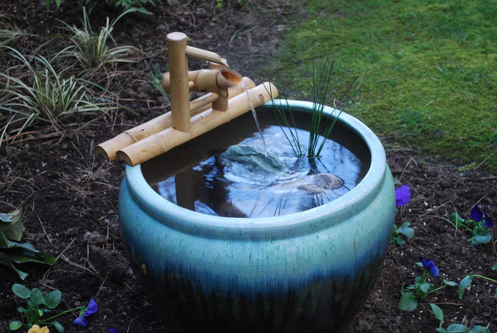japanese garden water fountain in a big vase