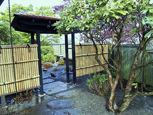 japanese wooden gate in a zen garden