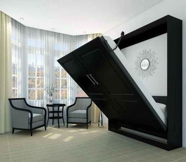modern and trendy black murphy bed in a cabinet