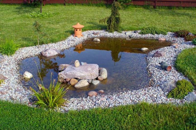 tiny japanese lantern in a zen garden