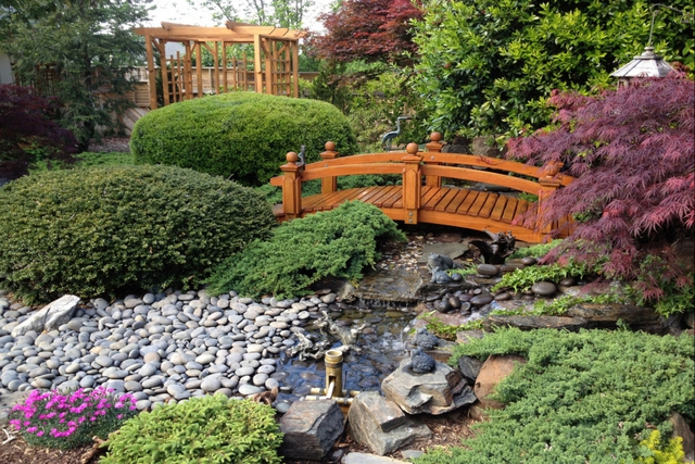 traditional footbridge in a japanese style garden
