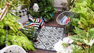 zen garden with acapulco chairs in a quiet garden