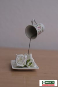 Decorating step to make floating floral cup and saucer