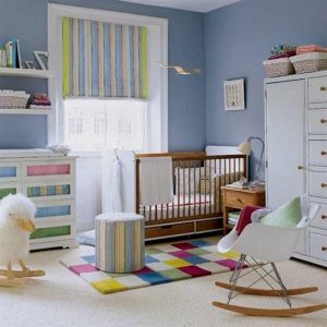 rocking chair for young mother of a baby boy room design idea