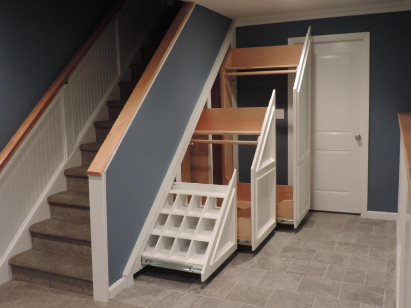 storage cabinet under a straight stair
