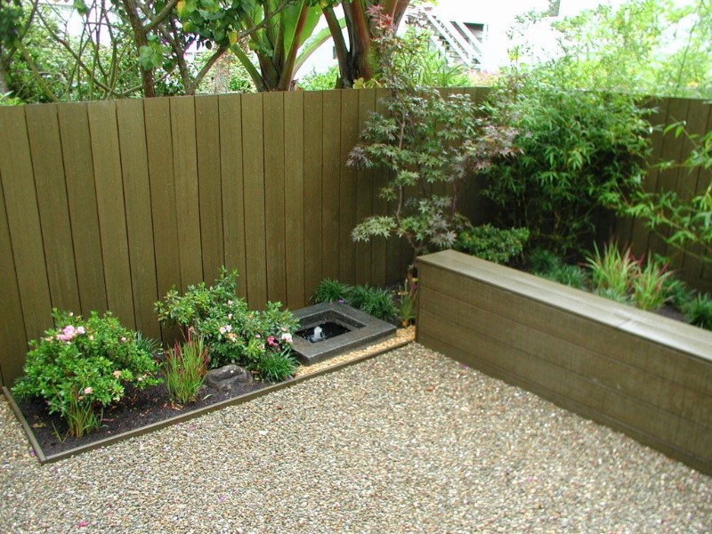 wood fence in a small japanese garden for home