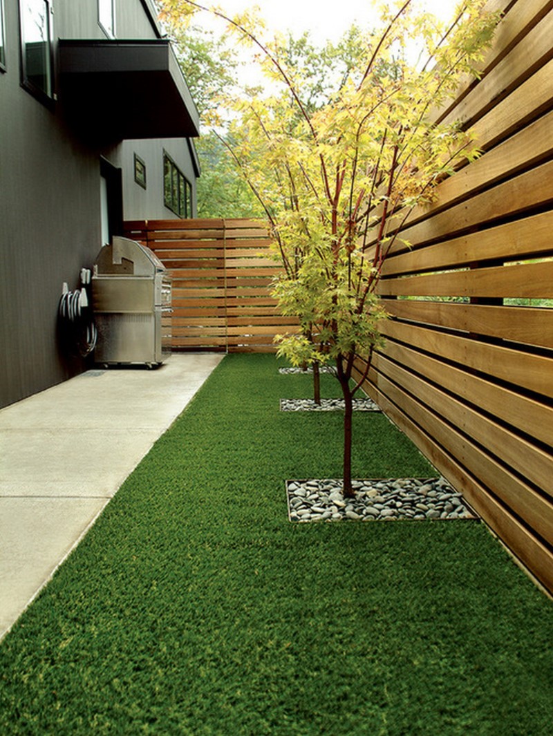 wooden fence panel in a small backyard with japanese garden