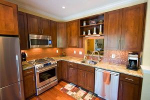 L shape wooden kitchen in a traditional home