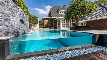 above ground glass rectangular pool for a luxury home