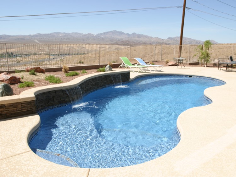fiberglass inground pool in a desert