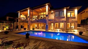 luxury mansion swimming pool at night