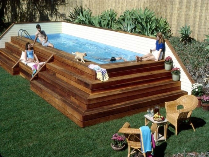 small pool above ground in a small backyard