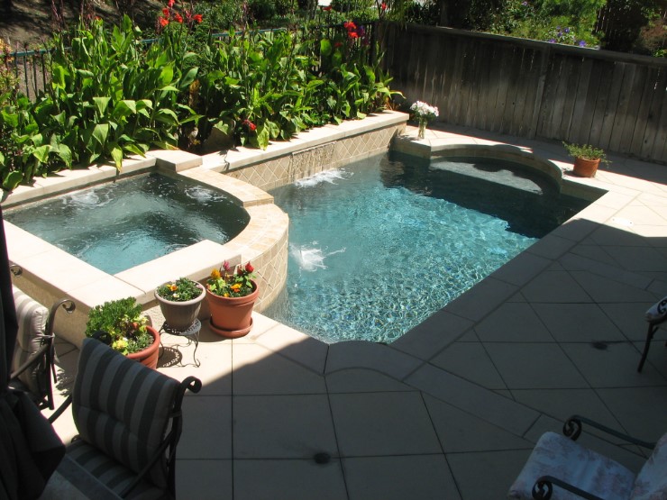 small pool with a jacuzzi