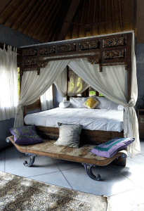 bali style bedroom with traditional indo decor