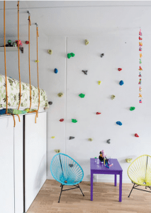 creative rock climbing holds on wall for children bedroom