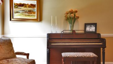 traditional upright piano placement in a classic home