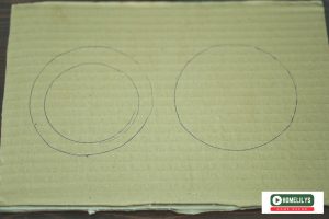 prepare to cut cardboard into two circles like here
