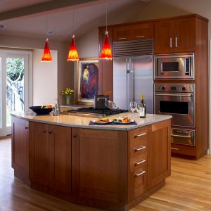 classic orange pendant light over kitchen area