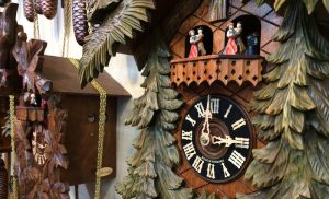 coo coo clock with hummel figurine
