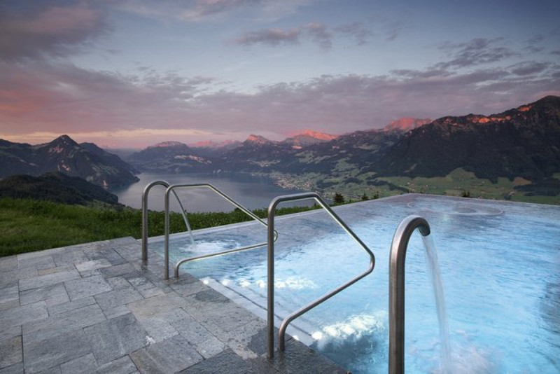 hotel villa honegg infinity pool overlooking lucern lake