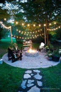 outdoor fire pit with string light for party